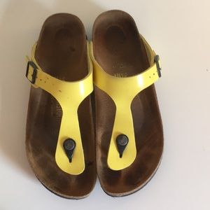 yellow toe strap birkenstocks, worn numerous times